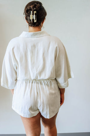 All white button down collared romper
